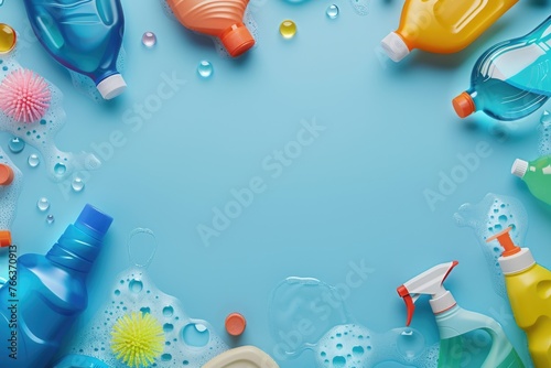A blue background with a row of cleaning supplies including a bottle of Windex. Concept of cleanliness and organization photo