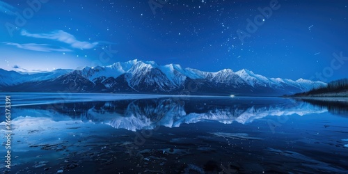 A beautiful night sky with mountains in the background and a large body of water. The stars are shining brightly, creating a serene and peaceful atmosphere