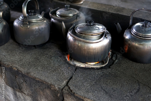 Classic kettle on a wood-burning stove