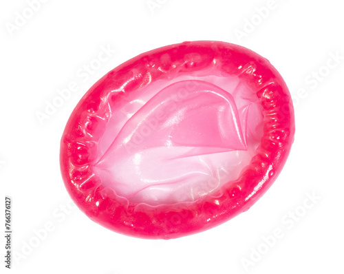 Red condom isolated on white