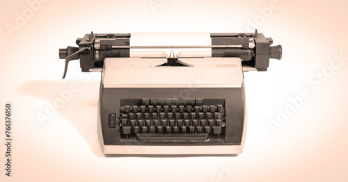 Broken metal typewriter, vintage object