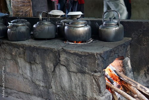 Classic kettle on a wood-burning stove