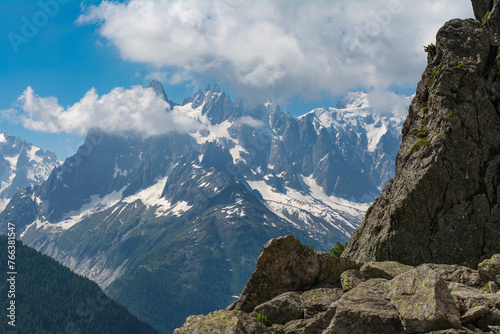 Picturesque view of the Mont Blanc mountain and glacier while hiking Tour du Mont Blanc. Popular tourist attraction. Alps, Chamonix-Mont-Blanc, France, Europe.