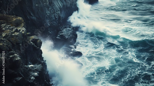 A coastal cliffside with waves crashing against the rocks below, creating a dramatic and awe-inspiring seascape.