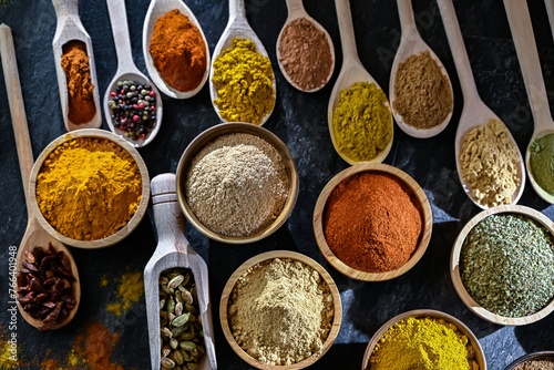 Fototapeta Naklejka Na Ścianę i Meble -  Composition with assortment of spices and herbs