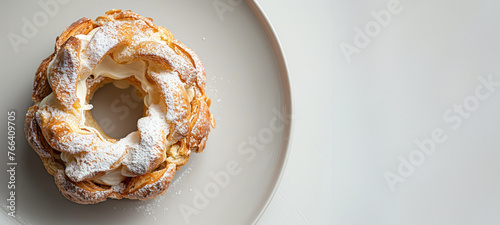  Top view paris brest with whipped cream on marble backgroundn free space for text usage  photo