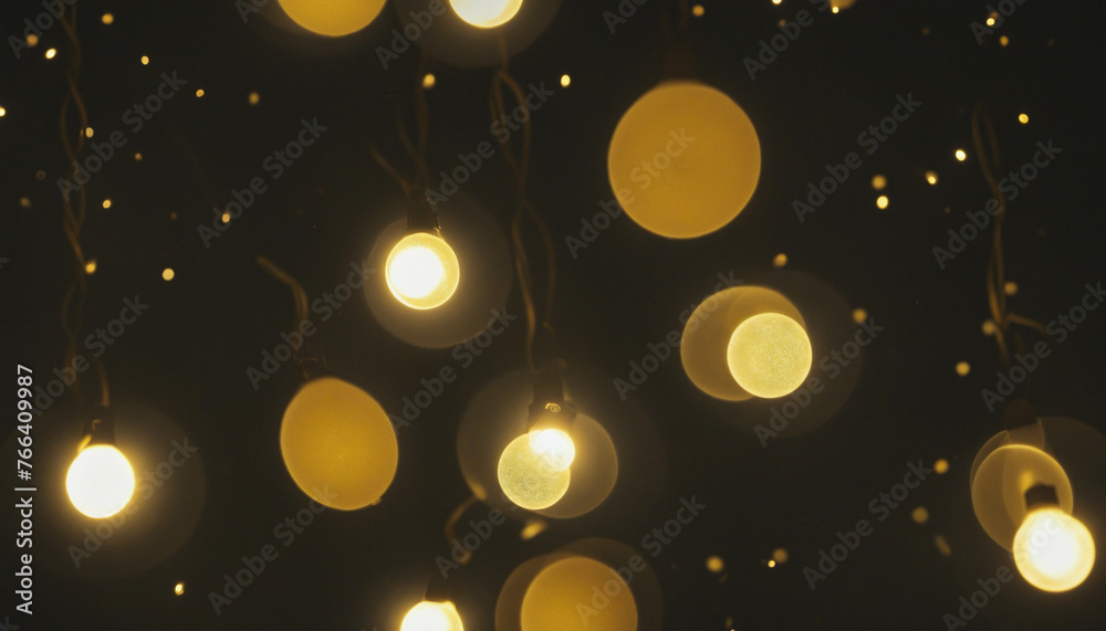 Christmas lighting and decoration: bokeh lights on a dark background colorful background