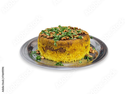 Maqloubeh is a Arabian traditional food dish includes chicken, rice, and fried cauliflower vegetables. Which is then flipped upside down when served, the name Maklouba which translates as upside-down.
