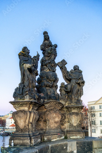 Statue of Madonna, St. Dominic and St. Thomas Aquinas on Charles Bridge in Prague.