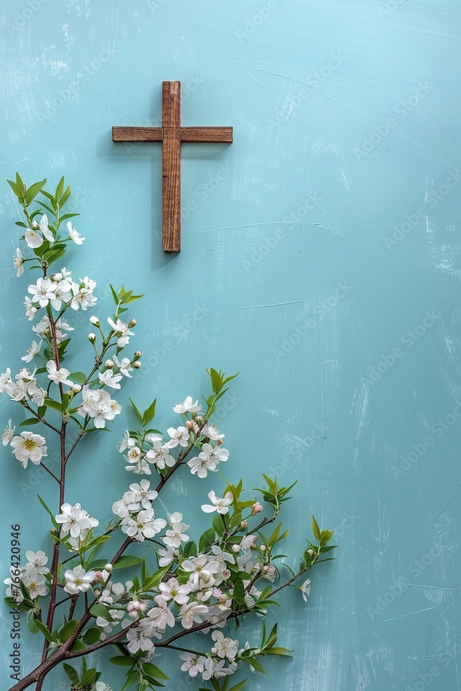 Religion background with a wooden cross and spring flowers against a blue background. Christianity Feast, Easter, Palm Sunday, Chrismnaing, or church wedding Religion background with a wooden cross and spring flowers against a blue background. Christianity Feast, Easter, Palm Sunday, Chrismnaing, or church wedding