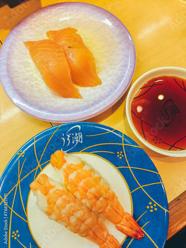 Delicious nigiri sushi and shrimp sushi at a Japanese restaurant in Tokyo. Traditional Japanese cuisine.