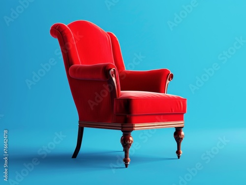 Red armchair isolated on blue background
