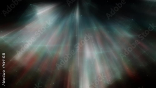 Abstract motion background shining colorful particles.Seamless 4K loop video.