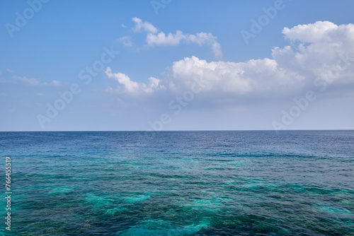 Fototapeta Naklejka Na Ścianę i Meble -  Blue ocean horizon blue sky and clouds