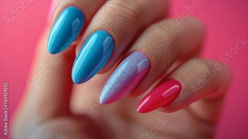 Colorful Nail Polish on Womans Hand