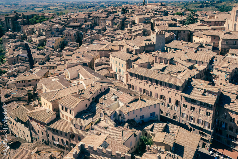 Aerial tapestry: Siena’s historic rooftops bask in sunlight