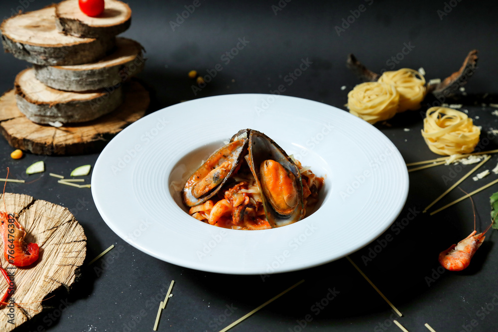 Deliciously Arranged Plate of Food on a Black Table Deliciously Arranged Plate of Food on a Black Table
