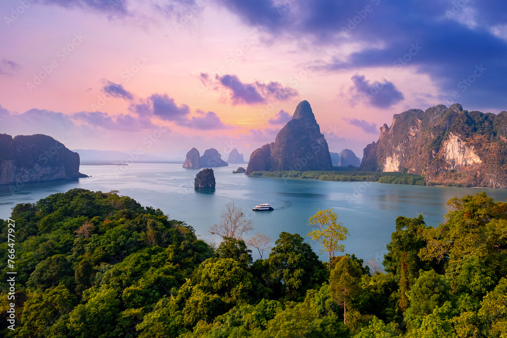 Sunset beautiful landscape of nature Thailand, Long tail boat with tourist on Hong tropical island and Phang Nga bay in turquoise sea, aerial view - obrazy, fototapety, plakaty 