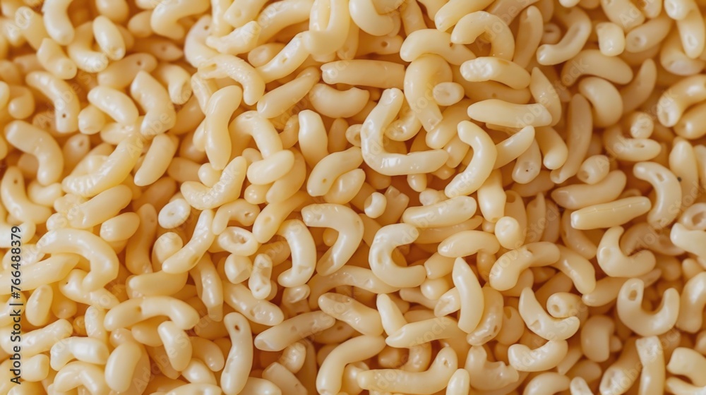Close up of a pile of macaroni noodles, perfect for food-related designs Close up of a pile of macaroni noodles, perfect for food-related designs