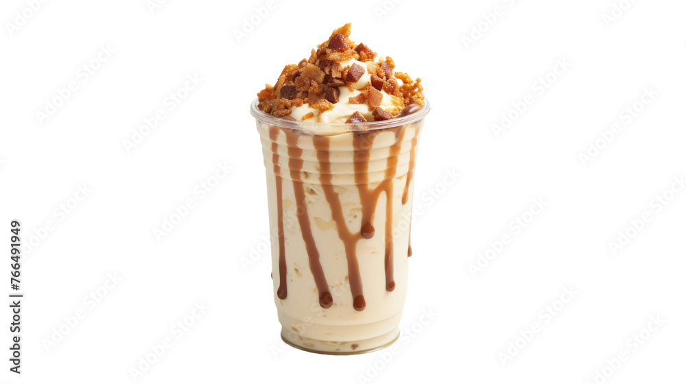 A decadent milkshake adorned with fluffy whipped cream and drizzled with sweet caramel sauce