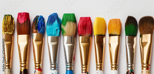 A spectrum of paintbrushes, isolated on white background, blank label.