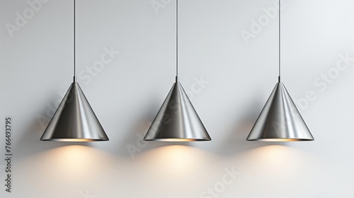 Sleek conical pendant lights in brushed steel, ideal for modern kitchens