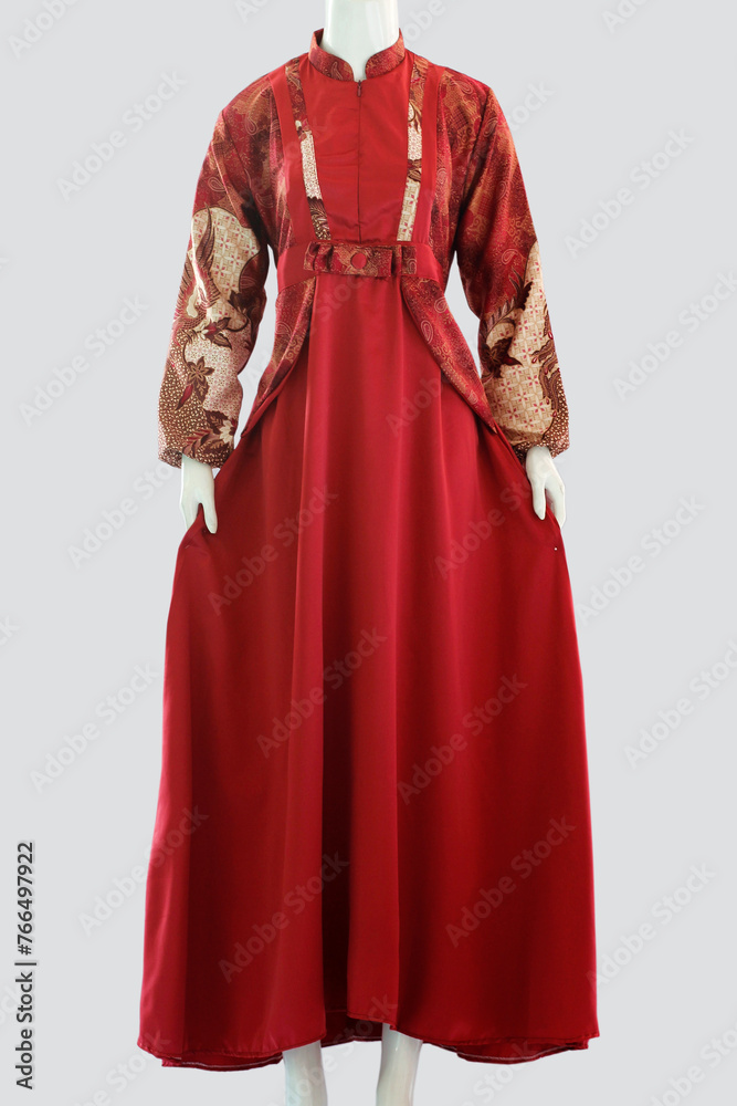 Long dress made from soft satin are widely worn by Malay women and Asian women in general because they convey the image of politeness of Eastern culture.