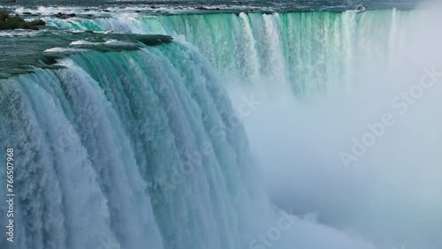 Aerial: Drone Panning Scenic View Of Horseshoe Falls - Niagara Falls Flowing On Rock Formation