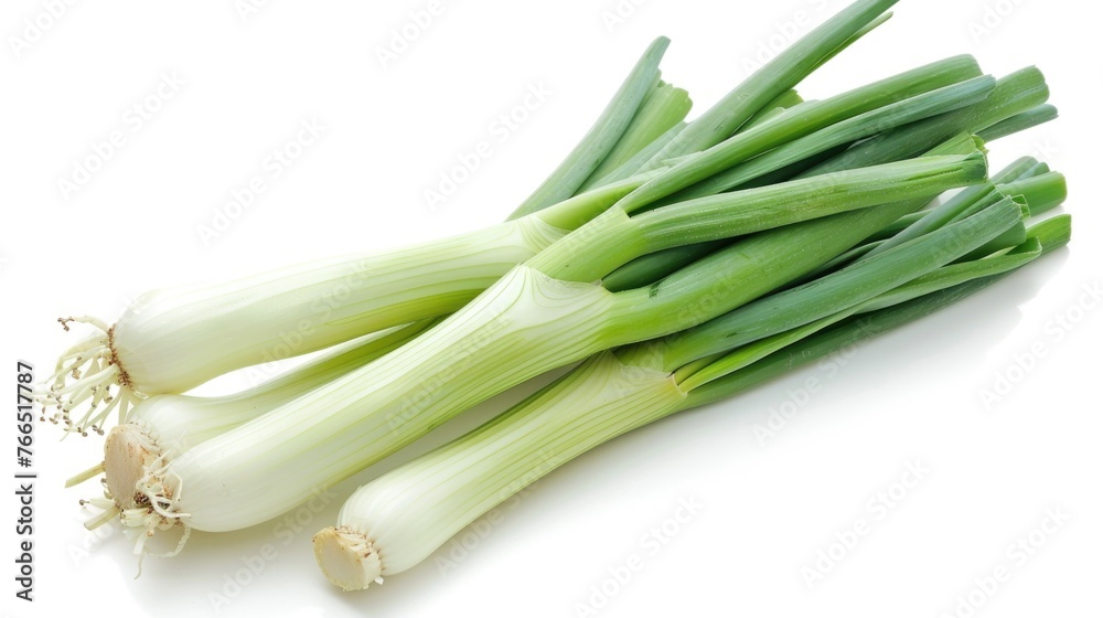 A bunch of green onions are displayed on a white background. The onions are fresh and ready to be used in a meal A bunch of green onions are displayed on a white background. The onions are fresh and ready to be used in a meal