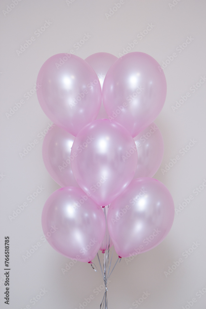 pearlescent pink balloons on white background pearlescent pink balloons on white background