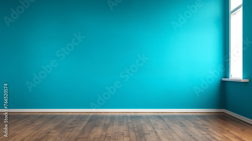 Photo of room with wood floors and blue wall with plenty of empty space to product display.