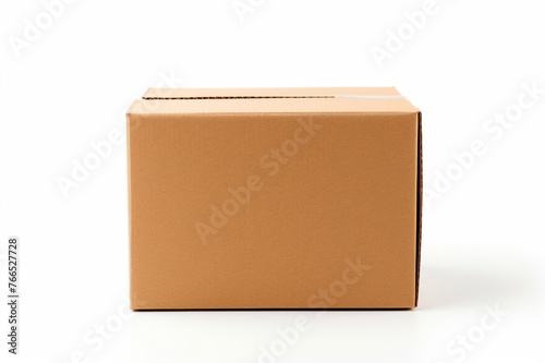 Single empty cardboard box with blank label, on a solid white background, lid propped open with a small object, © Khurram