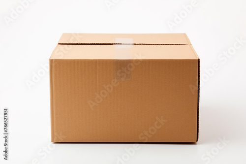 Single empty cardboard box with blank label, on a solid white background, lid completely open, showing the hollow core, © Khurram