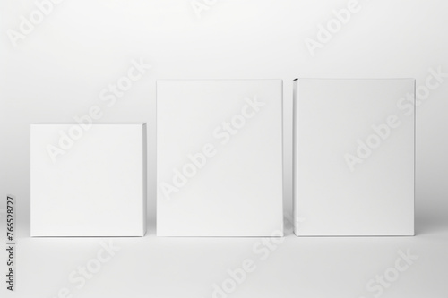 Single empty magnet white cardboard box with blank label on a solid white background, the box is in the background with a focused foreground on the blank label, © Khurram