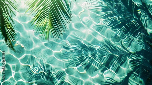 Water background palm leaf shadow on abstract white sand beach background, sun lights on water surface, beautiful abstract background concept banner for summer vacation at the beach green aqua texture © Sittipol 
