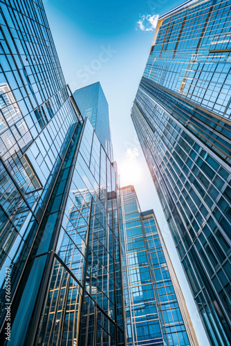A cluster of tall office buildings closely situated next to each other in an urban environment, showcasing modern architecture and city development.