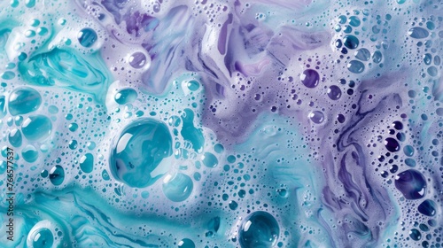 A bubbly, foamy texture background with a whimsical feel in shades of turquoise and purple.