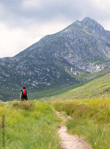 Hiker on the Glen Rosa route on the Isle of Arran, Scotland, UK