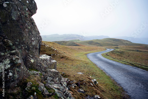 Winding road among rugged northern nature in the UK