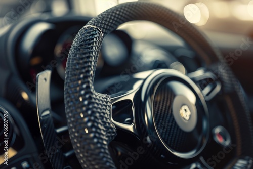 Luxury car steering wheel with carbon fiber finish. High-end vehicle interior showcasing modern design. Elegant automobile steering detail in premium cabin. © Irina.Pl