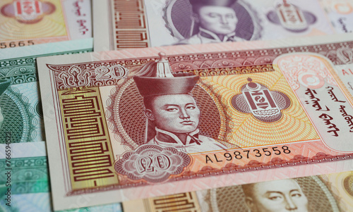 Closeup of old currency Mongolia  tugrik banknote with portrait of state founding member Damdin Sukhbaatar photo