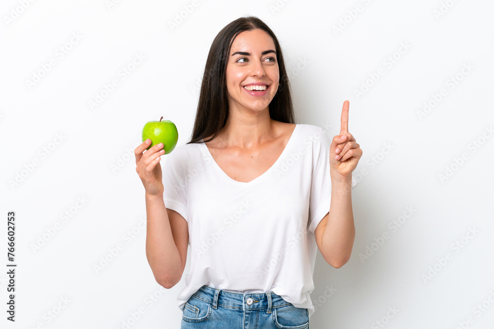 Young caucasian woman isolated on white background intending to realizes the solution while lifting a finger up Young caucasian woman isolated on white background intending to realizes the solution while lifting a finger up