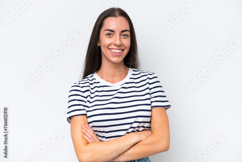 Young caucasian woman isolated on white background with arms crossed and looking forward