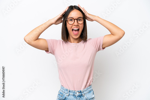 Young caucasian woman isolated on white background with surprise expression