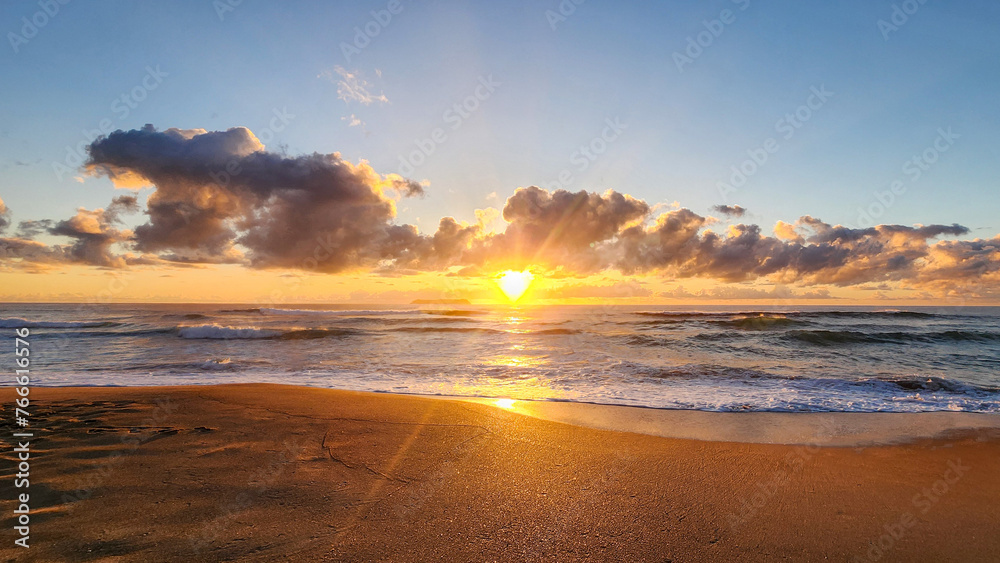Beautiful sunset on the beach. Seascape with sunbeams