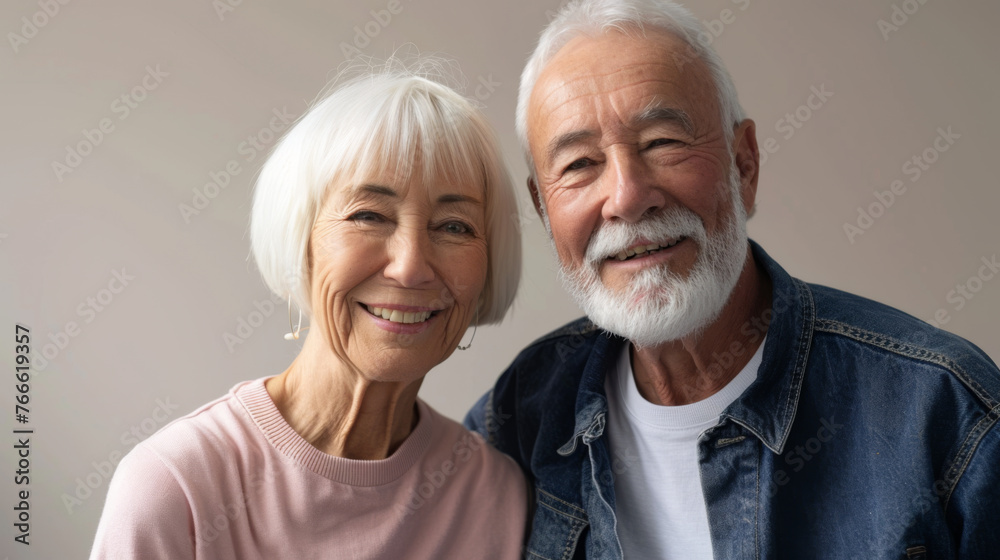 Two seniors are sharing a joyous moment together.