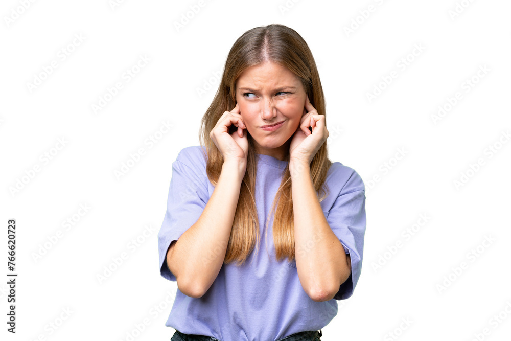 Young beautiful woman over isolated background frustrated and covering ears Young beautiful woman over isolated background frustrated and covering ears