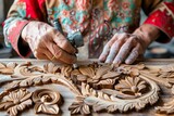 Artisan woodcarver crafting intricate designs with engraving tools