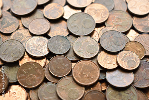 Euro cent coins texture background. One, two and five euro cent coins. Pile of euro cent coins.