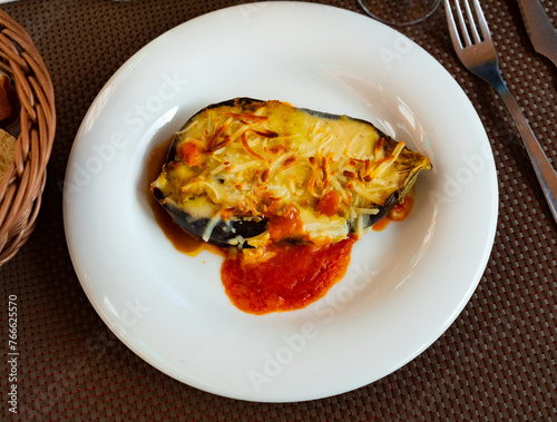 Popular dish all over the world is appetizing stuffed eggplant baked on top with cheese and tomato sauce